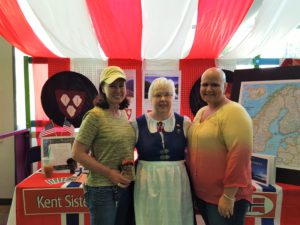 Susan Principe, Florence Amundsen & Dana Ralph checking out the Norway booth during the 2016 Kent International Festival