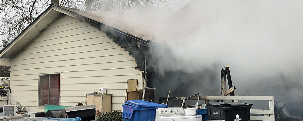 One rescued from house fire in Kent Monday morning