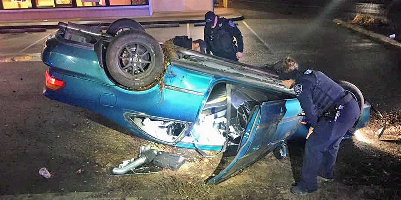 After police pursuit, driver crashes, rolls over car in Kent on Friday the 13th