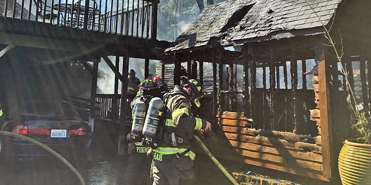 Fire in shed spreads to house in Kent Monday