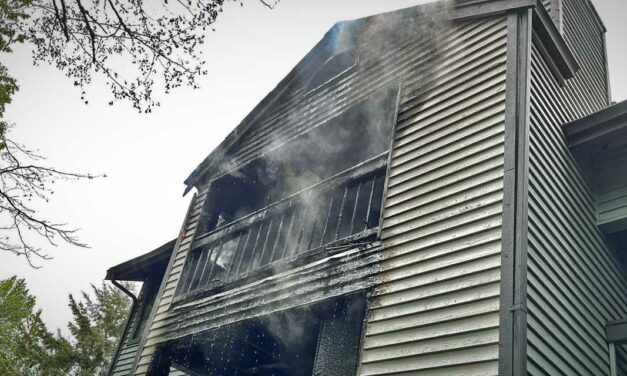 Resident rescued from 3rd floor balcony in apartment fire in Kent that displaced 8 families