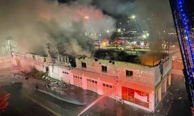 2-alarm fire breaks out at old feed store in Kent Friday morning